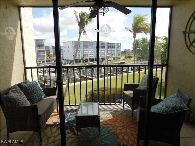 balcony featuring ceiling fan