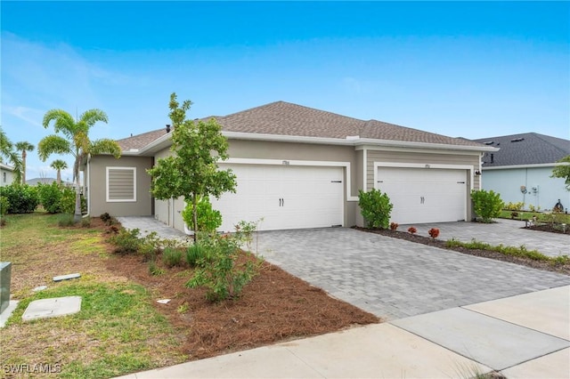 single story home with a garage