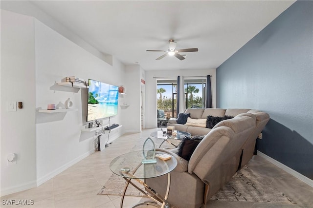 tiled living room with ceiling fan