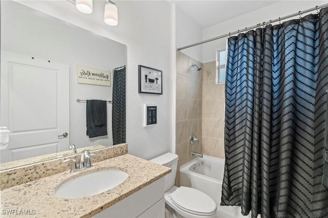 full bathroom with toilet, vanity, and shower / bath combination with curtain