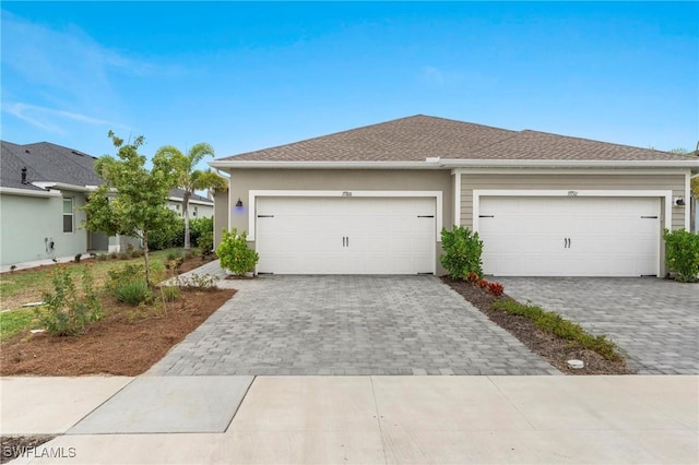 view of front of home with a garage