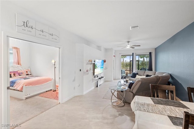 living room with ceiling fan