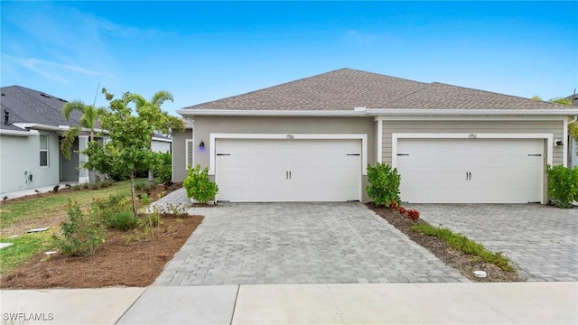 single story home with a garage