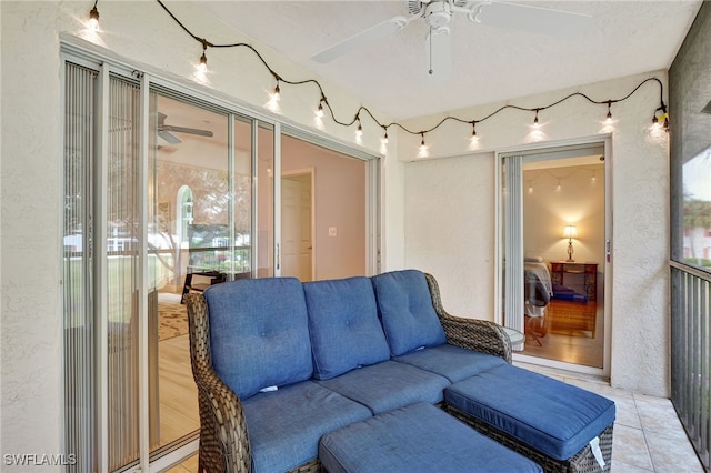 tiled living room featuring a textured ceiling