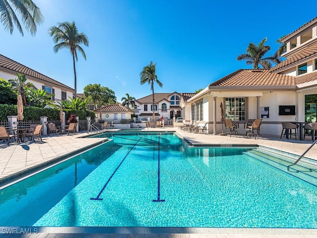 view of swimming pool featuring a patio