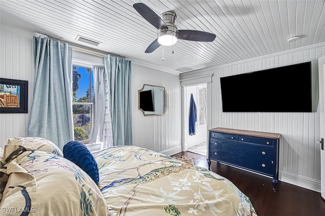 bedroom featuring dark hardwood / wood-style flooring and ceiling fan