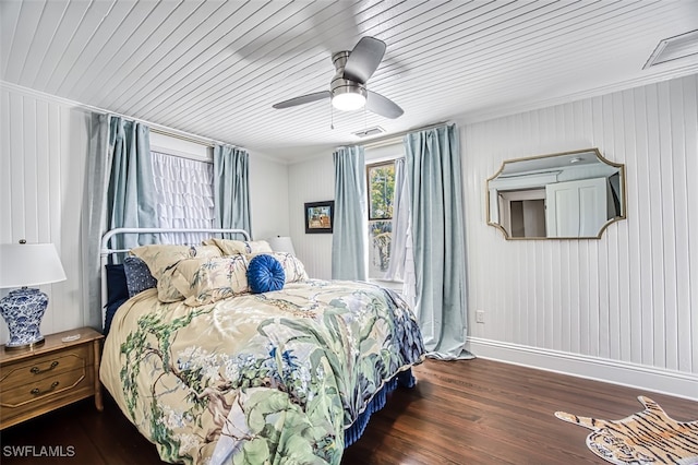 bedroom featuring dark wood-type flooring and ceiling fan