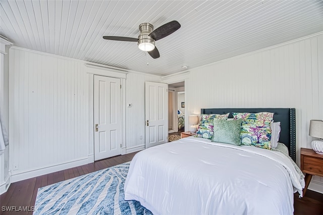 bedroom with dark wood-type flooring and ceiling fan