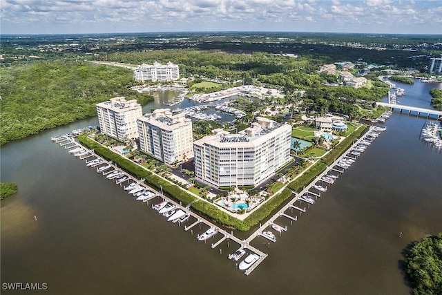 birds eye view of property featuring a water view