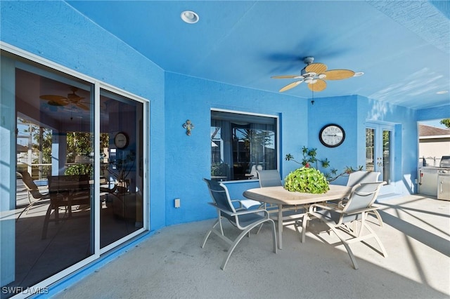 view of patio with ceiling fan