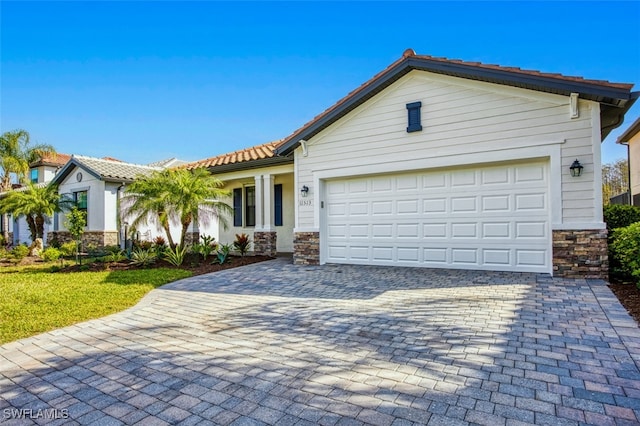 view of front of property with a garage