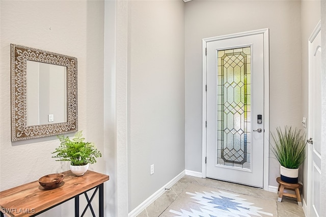 view of tiled foyer