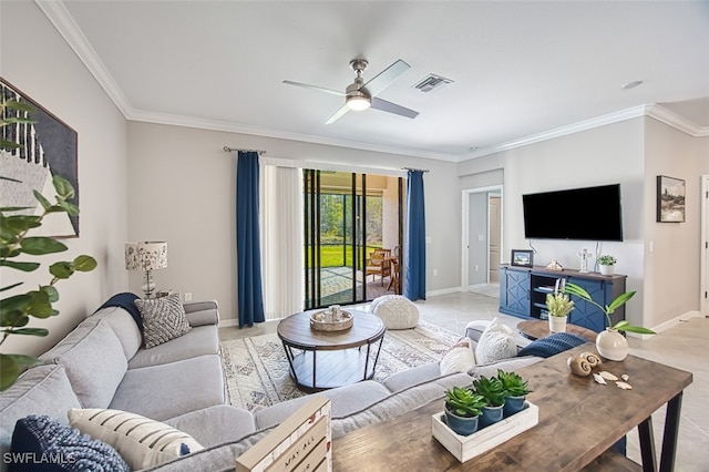 tiled living room with ceiling fan and crown molding