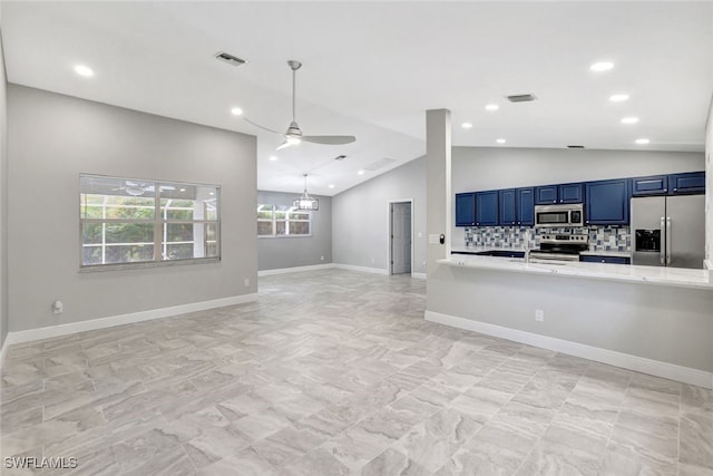 unfurnished living room featuring ceiling fan and high vaulted ceiling