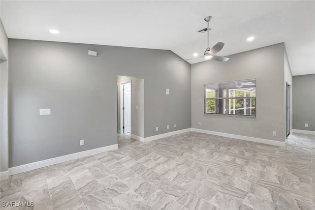 unfurnished room featuring vaulted ceiling and ceiling fan