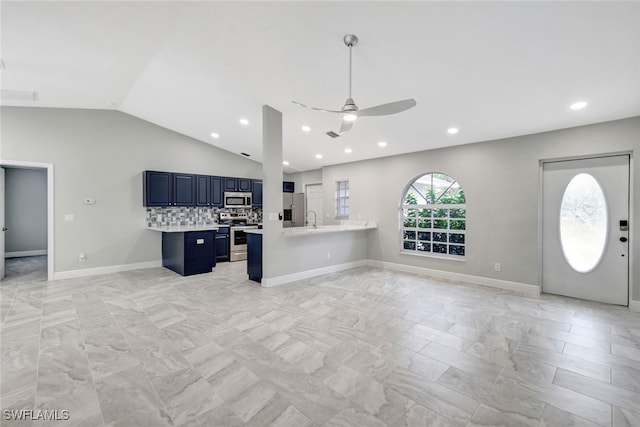 unfurnished living room featuring ceiling fan, lofted ceiling, and sink