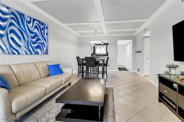 living room featuring coffered ceiling and light tile patterned flooring