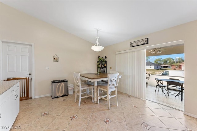 tiled dining room with ceiling fan