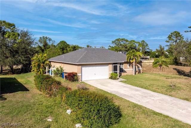 ranch-style house featuring a garage and a front lawn