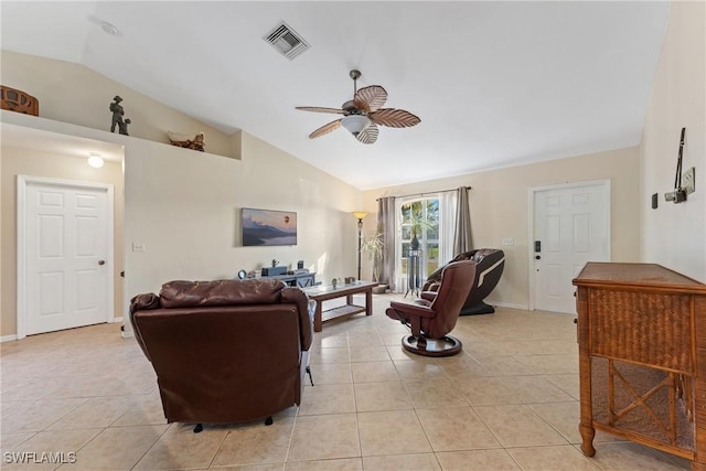 tiled living room featuring ceiling fan and lofted ceiling