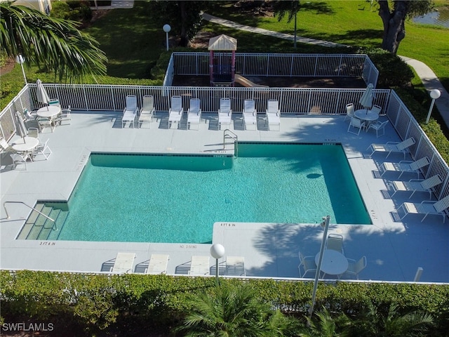 view of pool featuring a patio area