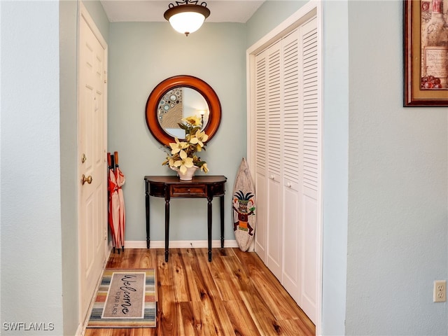 corridor featuring light hardwood / wood-style flooring