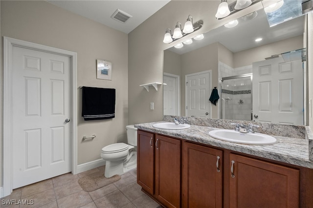 full bath with tile patterned floors, a sink, visible vents, and a shower stall