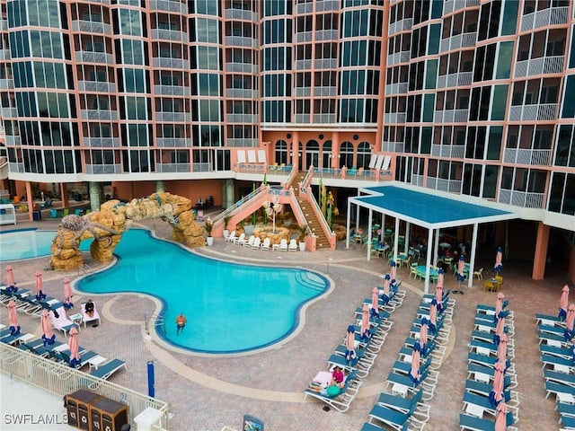 view of swimming pool featuring a patio