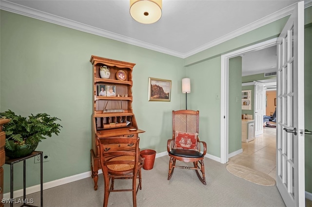 living area with crown molding and french doors