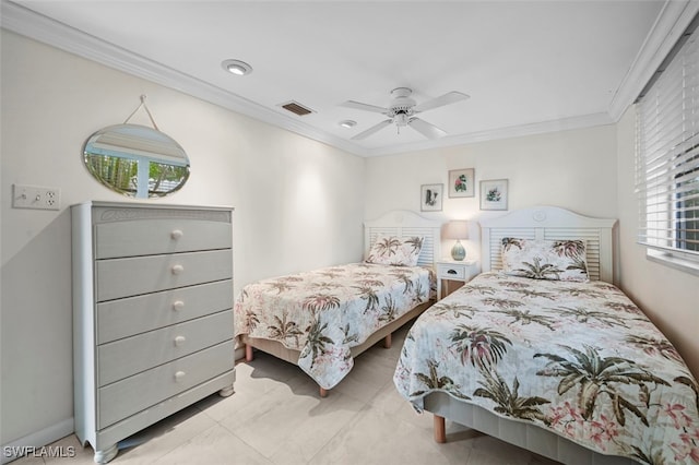 bedroom with ceiling fan and ornamental molding