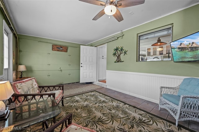 living area featuring ceiling fan