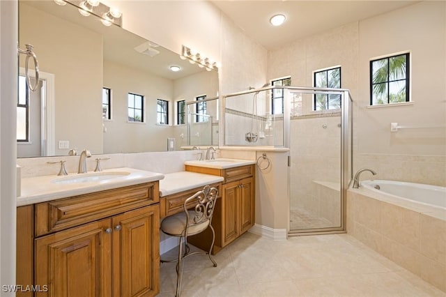 9284 Trieste Dr, Fort Myers, FL 33913 - full bath featuring a stall shower, a wealth of natural light, a sink, and a garden tub