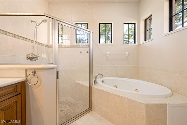 9284 Trieste Dr, Fort Myers, FL 33913 - full bath with a jetted tub, a healthy amount of sunlight, a stall shower, and vanity