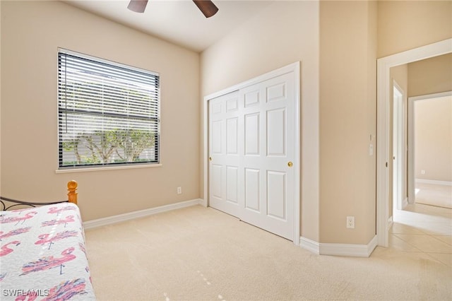 9284 Trieste Dr, Fort Myers, FL 33913 - unfurnished bedroom with baseboards, a ceiling fan, and carpet