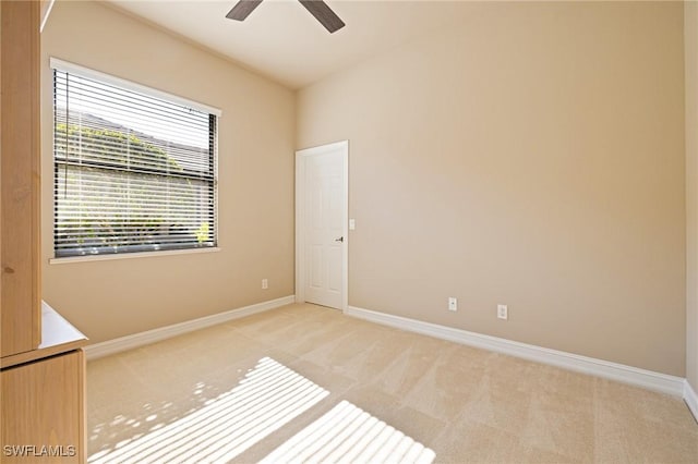 9284 Trieste Dr, Fort Myers, FL 33913 - unfurnished room featuring a ceiling fan, light carpet, and baseboards