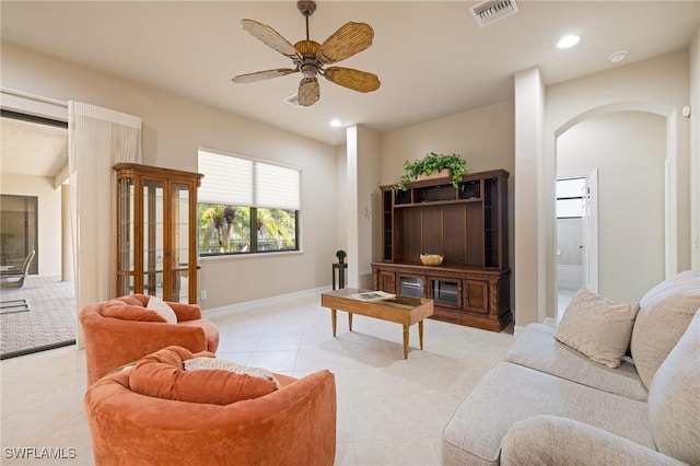 9284 Trieste Dr, Fort Myers, FL 33913 - living area with visible vents, recessed lighting, a ceiling fan, arched walkways, and light tile patterned floors