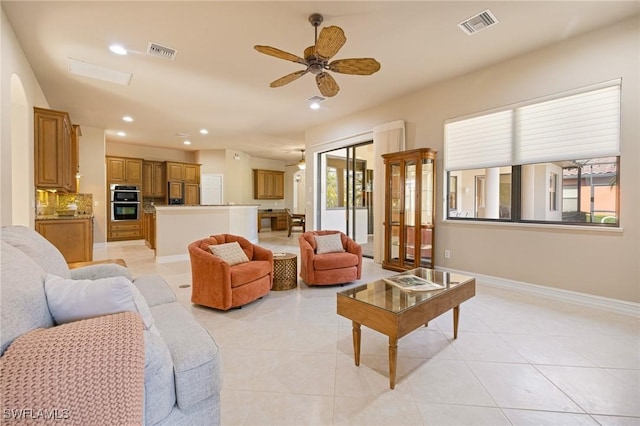 9284 Trieste Dr, Fort Myers, FL 33913 - living room featuring light tile patterned flooring, visible vents, recessed lighting, and a ceiling fan