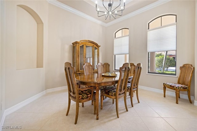 9284 Trieste Dr, Fort Myers, FL 33913 - dining room with crown molding, a tray ceiling, an inviting chandelier, light tile patterned floors, and baseboards