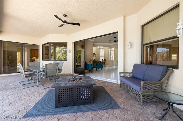 9284 Trieste Dr, Fort Myers, FL 33913 - view of patio / terrace with a ceiling fan, outdoor dining area, and an outdoor living space with a fire pit