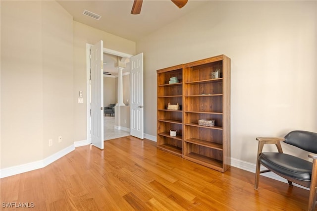 9284 Trieste Dr, Fort Myers, FL 33913 - unfurnished room featuring baseboards, visible vents, light wood-style floors, and a ceiling fan