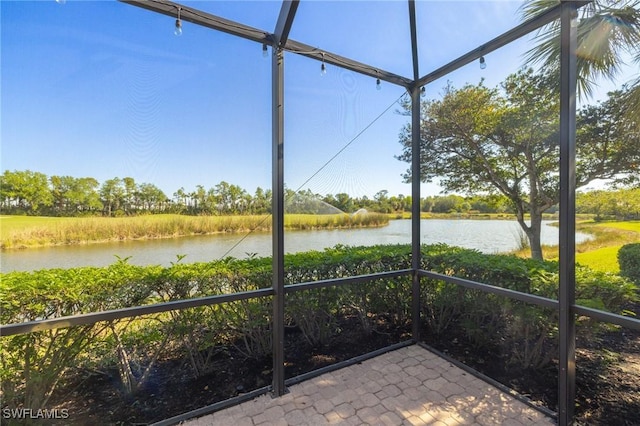 9284 Trieste Dr, Fort Myers, FL 33913 - unfurnished sunroom with a water view