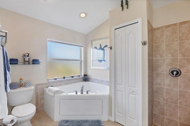 bathroom with tile patterned floors, toilet, separate shower and tub, and vaulted ceiling