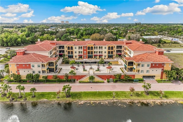 bird's eye view with a water view