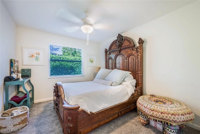 bedroom with ceiling fan and carpet flooring