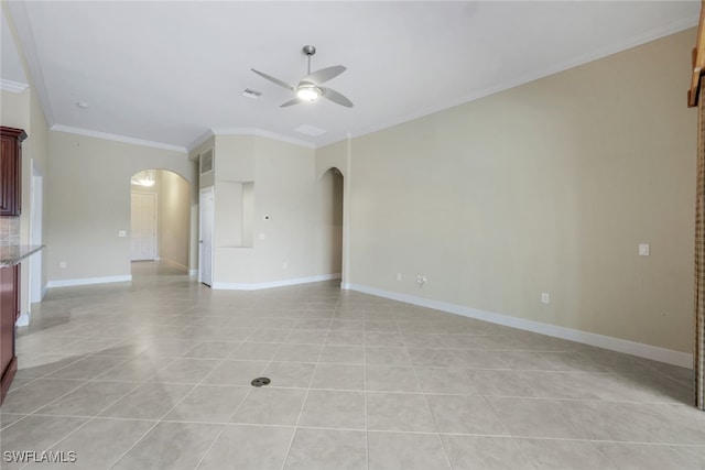 unfurnished living room with ceiling fan, light tile patterned floors, and crown molding