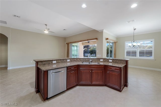 kitchen with ceiling fan with notable chandelier, dishwasher, light stone counters, and sink