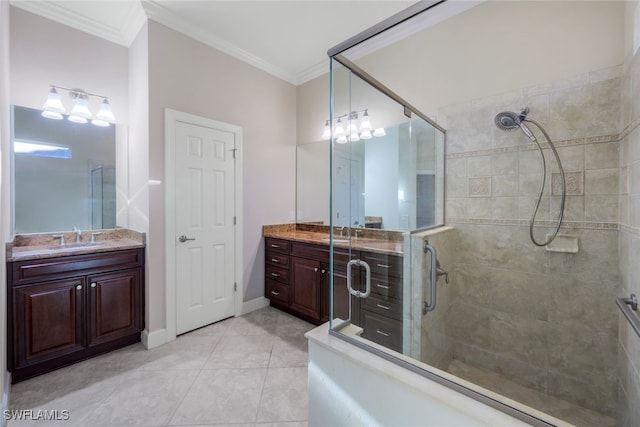 bathroom with crown molding, tile patterned floors, vanity, and a shower with shower door