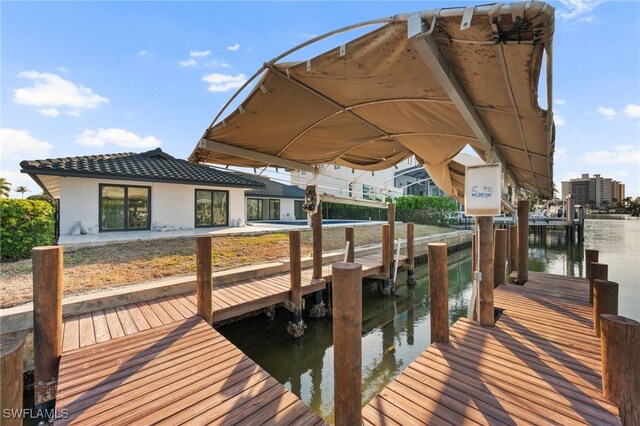 view of dock with a water view