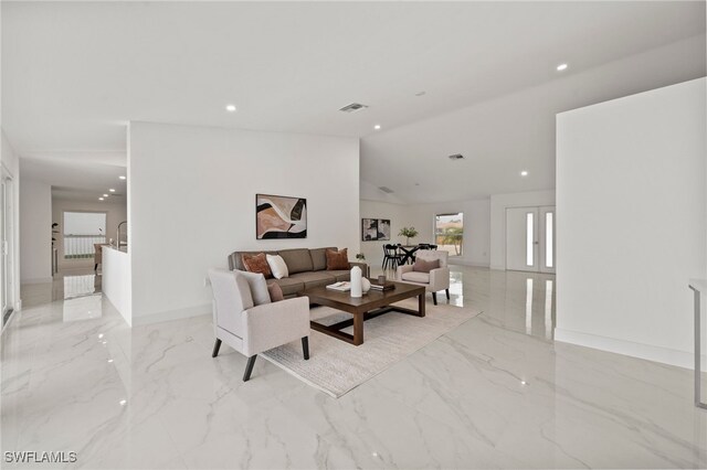 living room with lofted ceiling