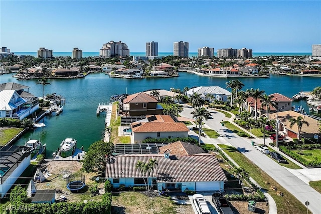 drone / aerial view featuring a water view